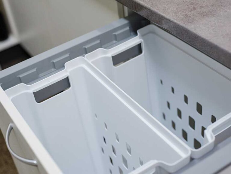 Double bin storage for whites and coloured laundry