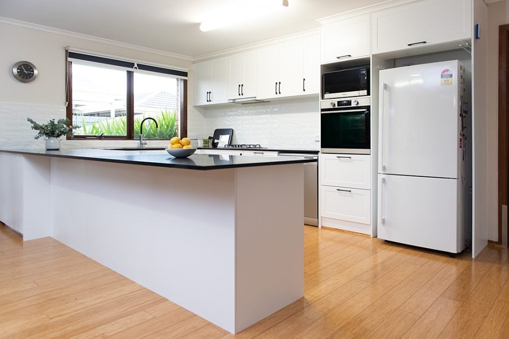 galley kitchen using white kitchen cabinetry