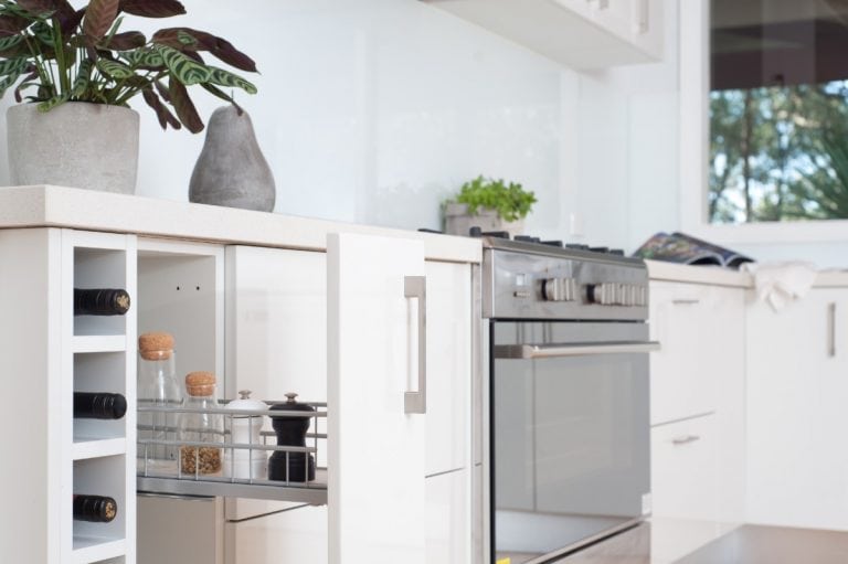 white kitchen with slide out rack