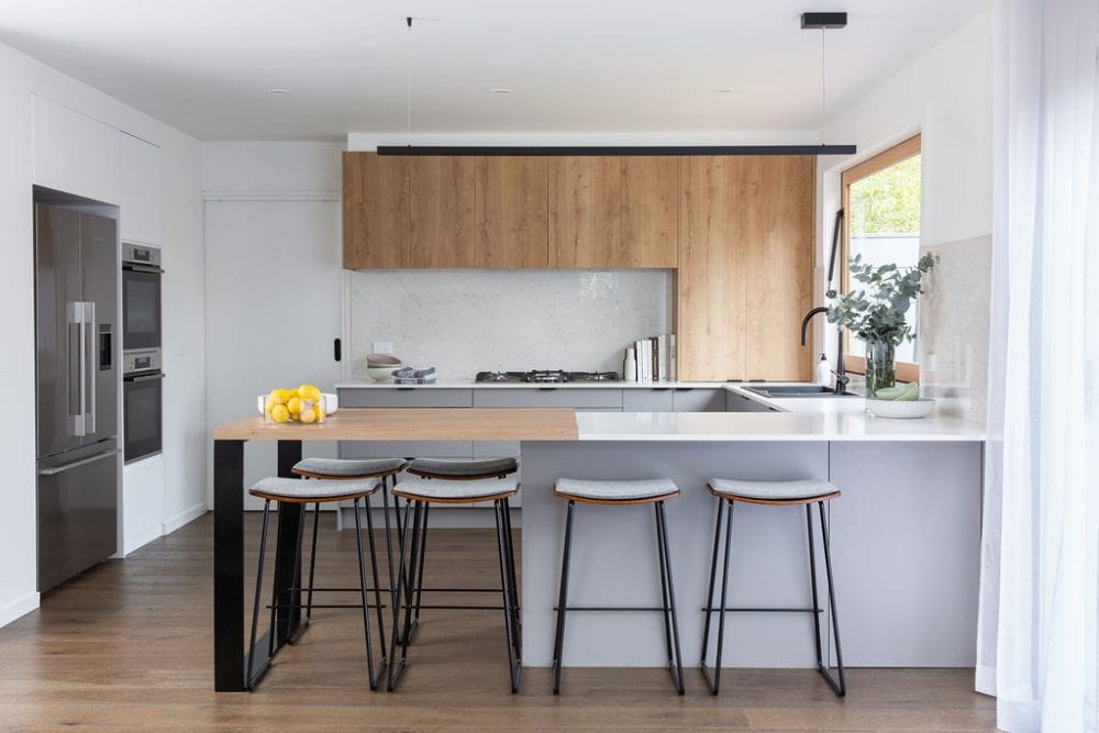 u shaped kitchen featuring grey and timber laminate cabinetry
