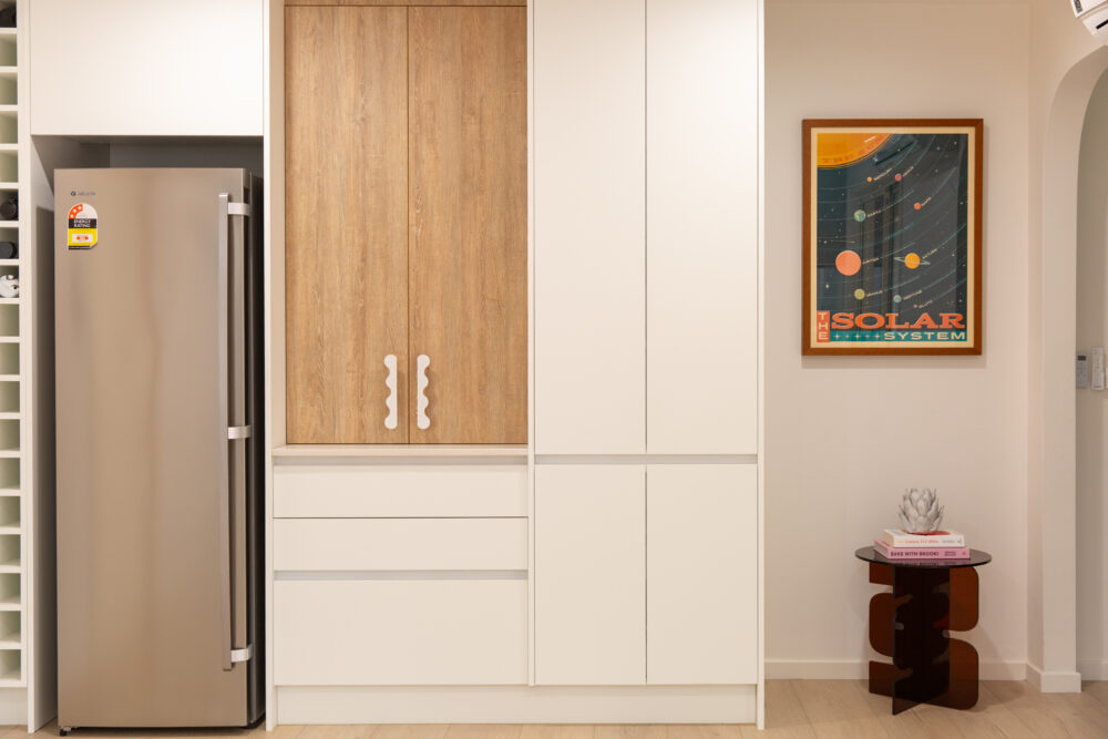 White and oak timber double pantry with drawers and cupboards underneath