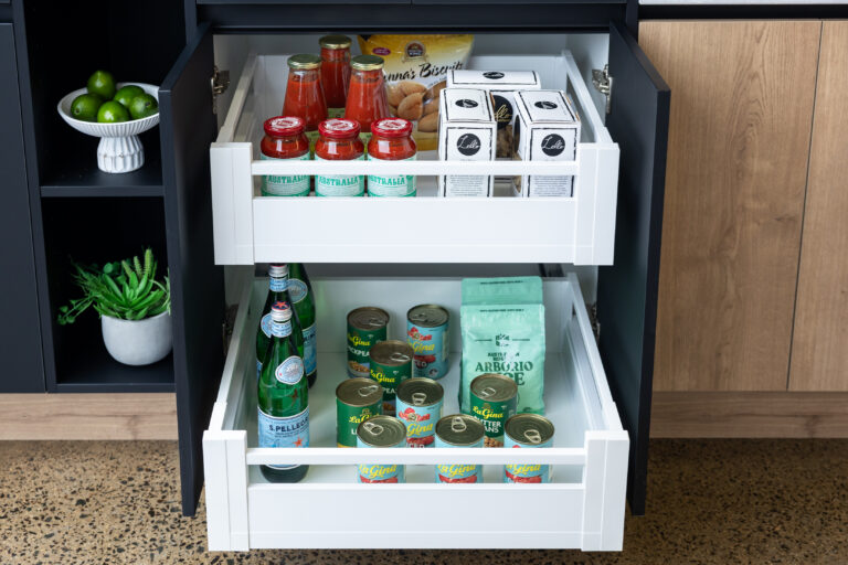 Pull out kitchen shelves featuring pantry staples