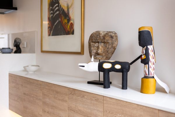 Living room cabinetry with oak timber laminate cabinetry and white stone benchtops