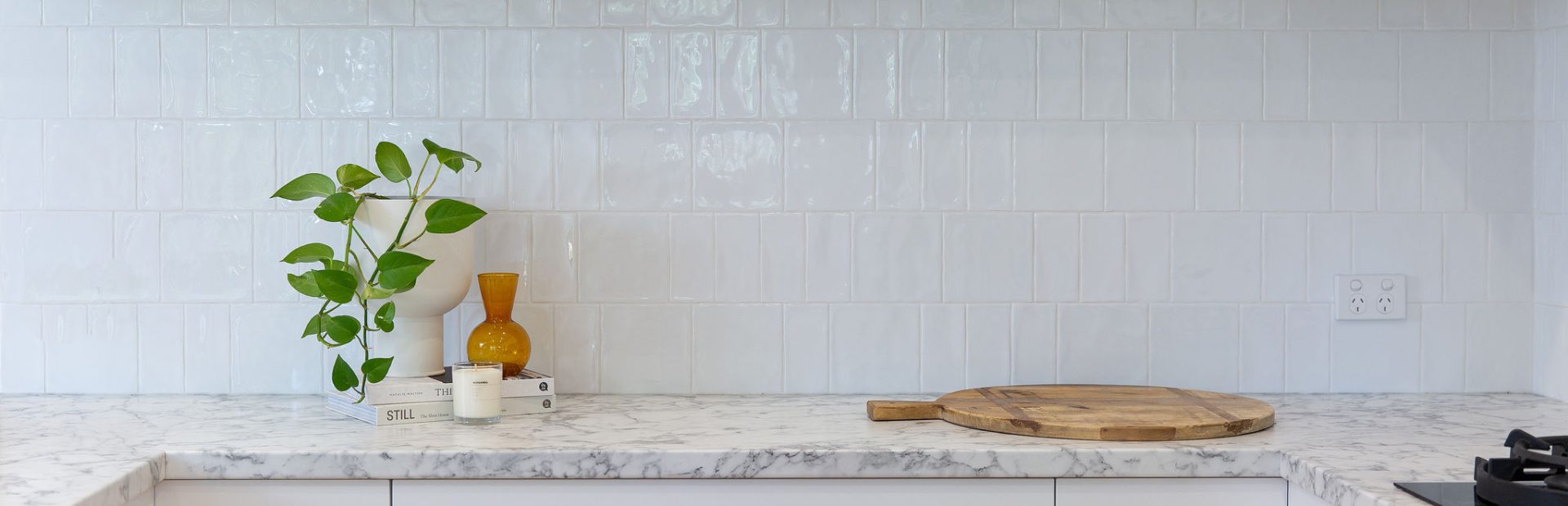 White shaker style kitchen with Durpoal Carrara Marble benchtops