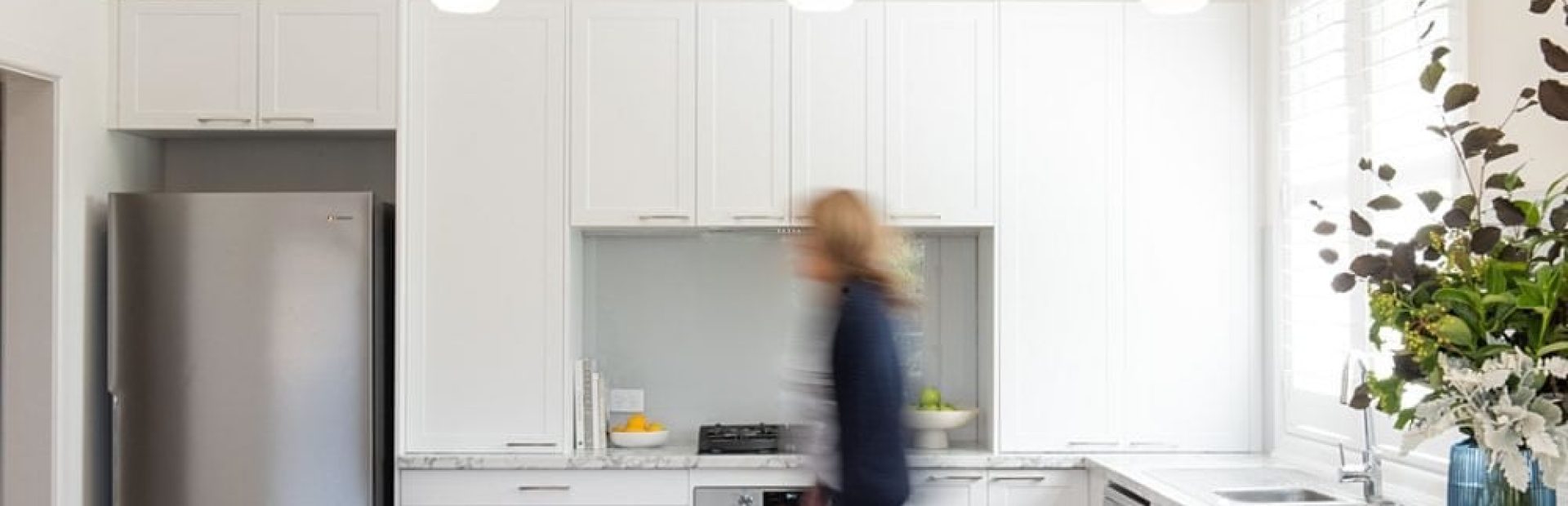 white shaker kitchen with laminate benchtops